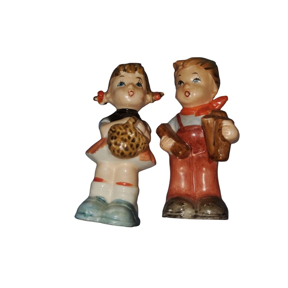 Set of vintage boy and girl salt and pepper shakers